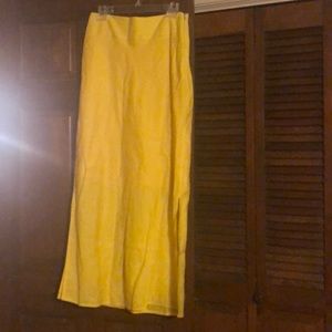 Long yellow skirt with two slits on each side